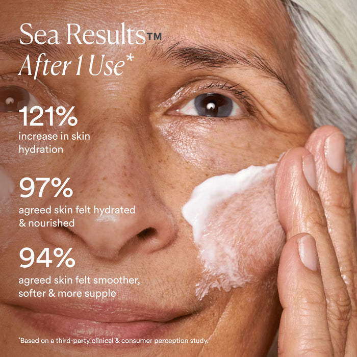 Close-up of an older woman applying OSEA Advanced Protection Cream, revealing soft, hydrated skin. Clinical results: 121% boost in hydration, 97% felt more hydrated, and 94% noticed smoother, softer skin after one use.