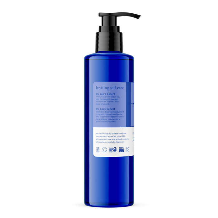 A tall blue pump bottle of EO Products Body Lotion labeled Inviting self-care stands against a white background. The label highlights scent and body benefits, enriched with mango seed butter. Icons below indicate cruelty-free, vegan, and recyclable packaging.