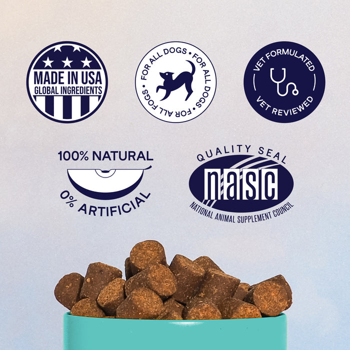 A close-up of a bowl filled with brown dog treats. Surrounding the bowl are various certification badges, including "Made in USA," "For All Dogs," "Vet Formulated," "100% Natural," and a "Quality Seal" from the National Animal Supplement Council (NASC).
