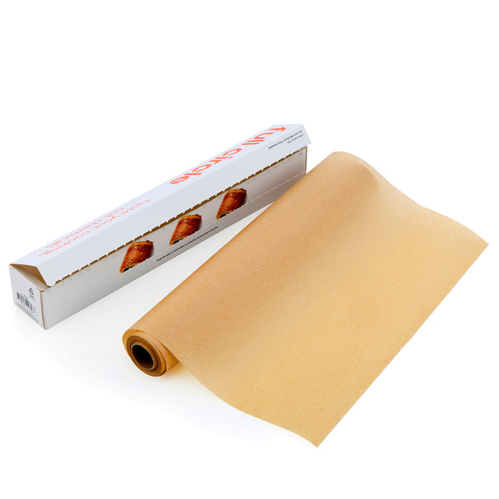 A partially unrolled Full Circle Compostable Parchment Paper Roll sits in front of its white box, which displays images of baked goods.