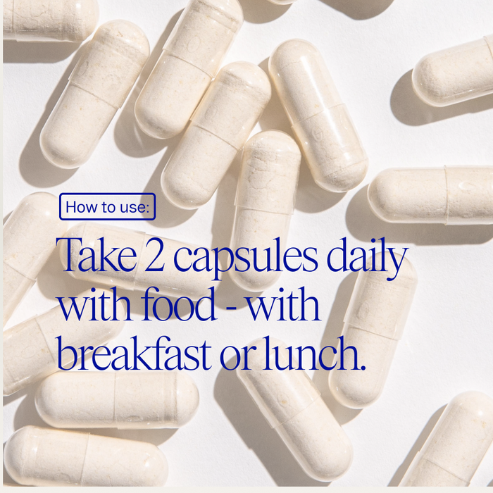 Several white Lady Bugs: Synbiotic for Women Capsules by Ora Organic are scattered on a light surface. Text reads: Take 2 capsules daily with food—at breakfast or lunch—to support your female microbiome and vaginal health.