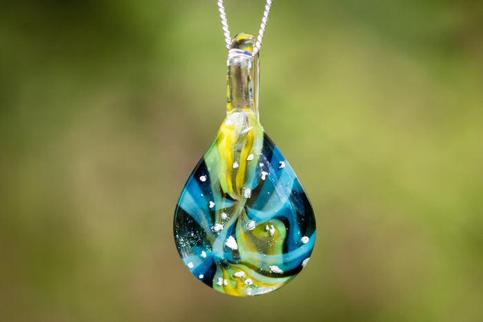 cremation jewelry ocean sunset