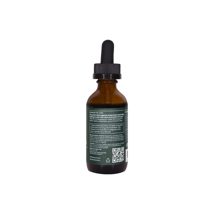 The Organic Kapha Tincture - Energizing by Sattva Soul is an Ayurvedic herbal liquid in a brown glass dropper bottle with a black cap. It features a rear label with text and a QR code, centered on a white background to help balance Kapha Dosha.