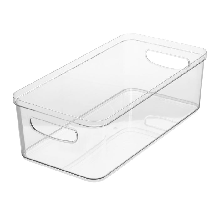 The iDesign Organizer Bin with Handles, made from recycled plastic, is a compact modular storage solution featuring a clear rectangular design with cutout handles on both ends for easy viewing and organizing of contents in any space.