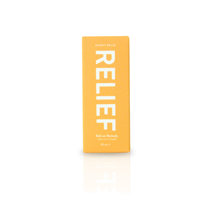 A bright yellow box labeled RELIEF in large white letters contains a 10 ml Honey Belle Roll-on Remedy, enhanced with essential oils offering aromatherapy benefits.