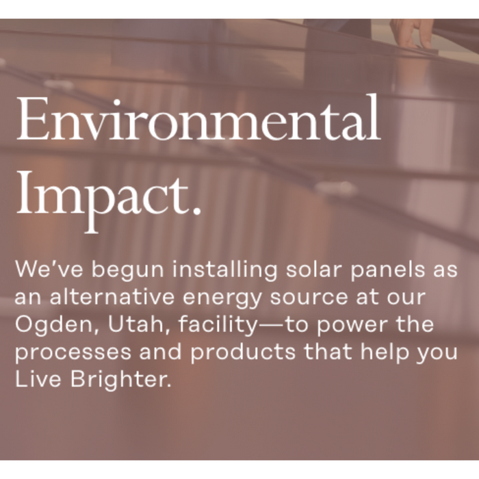 Text image with the heading "Environmental Impact." It discusses installing solar panels at a facility in Ogden, Utah, to enhance processes and promote the message "Live Brighter." The background shows a reflection, possibly of solar panels.