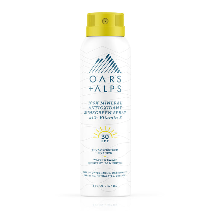 Oars + Alps 100% Mineral Antioxidant Sunscreen Spray - SPF 30 offers broad-spectrum UVA/UVB protection with Vitamin E. The white can features blue text, a yellow cap, and sun graphics.