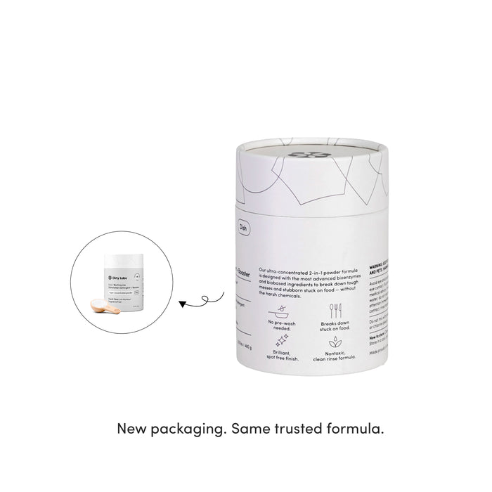 A sleek, cylindrical white container with a minimalist design displays Dirty Labs 2-in-1 Bio Enzyme Dishwasher Detergent + Booster. Next to it is a smaller image of the previous packaging and a scoop. Text below reads: New packaging. Same trusted 2-in-1 formula with bioenzymes from Dirty Labs.