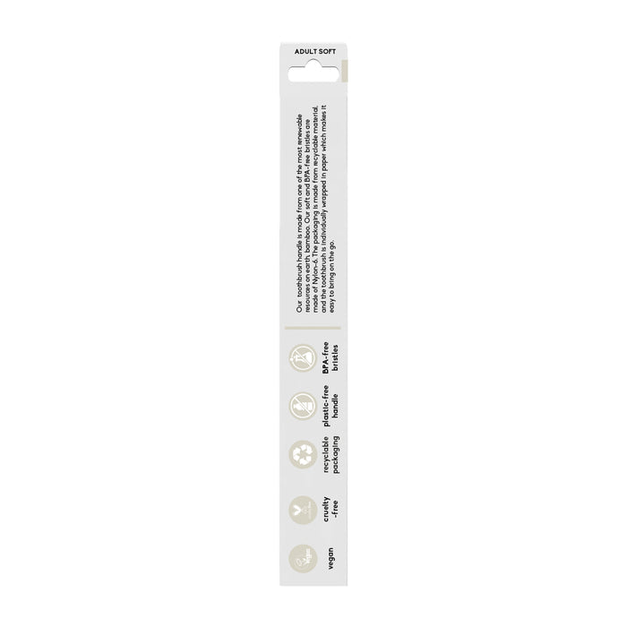 Side view of The Humble Co.s Adult Bamboo Toothbrush - Soft package shows icons for plaque removal, eco-friendliness, comfort, and vegan materials. This dentist-approved toothbrush has nylon bristles for effective cleaning and uses sustainable materials.