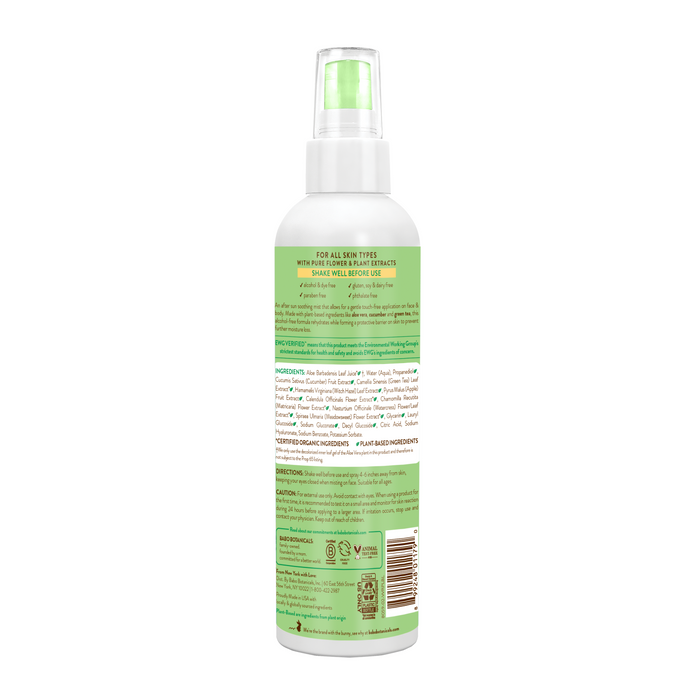 The After Sun Aloe Vera & Cucumber Soothing Mist by Babo Botanicals is in a green and white cylindrical spray bottle with a transparent cap, optimal for sensitive skin. The alcohol-free mists label details ingredients and usage instructions.