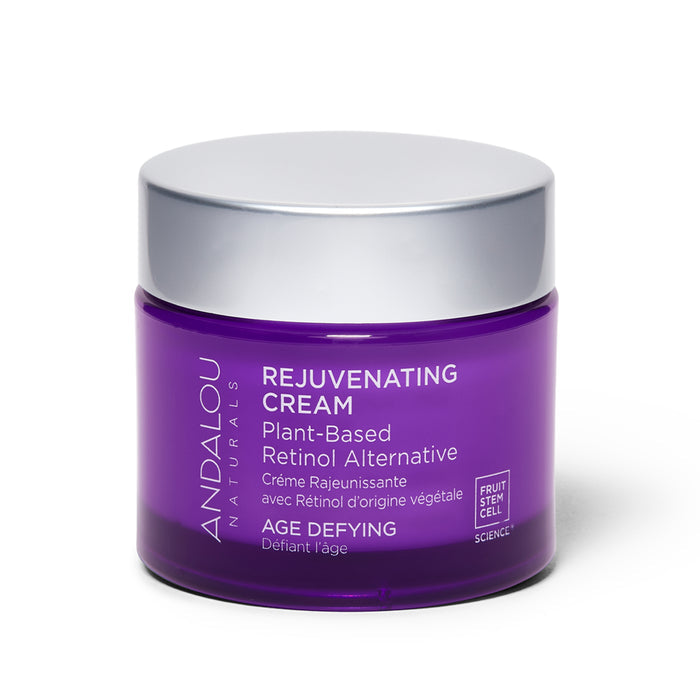 Andalou Naturals Age Defying Rejuvenating Plant Based Retinol Alternative Cream, packaged in purple, features bakuchiol as a plant-based retinol alternative and highlights fruit stem cell science.