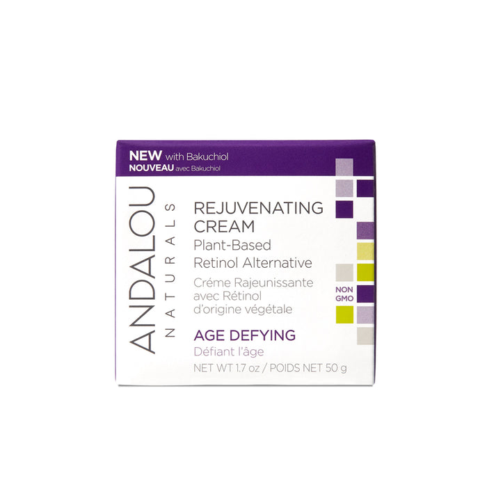 The box of Andalou Naturals Age Defying Rejuvenating Plant-Based Retinol Alternative Cream highlights bakuchiol, a plant-based retinol, boosted by fruit stem cell science. It has Age Defying and Non-GMO labels in English and French. Net weight: 50g.