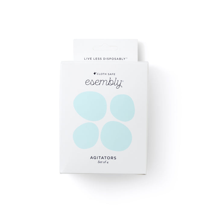 A white box from Esembly Baby features the phrase Live Less Disposably and contains a set of 4 eco-friendly Agitator Washer/Dryer Balls. The simple design includes four light blue circles, underscoring their cloth-safe, silicone craftsmanship.
