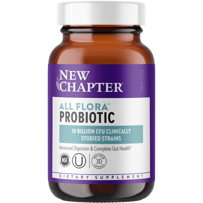 A brown glass bottle with a white cap labeled All-Flora™ Probiotic for Advanced Digestion & Complete Gut Health by New Chapter contains 10 billion CFU of clinically studied strains. It promotes probiotics and prebiotics, featuring NSF and kosher symbols on the label.