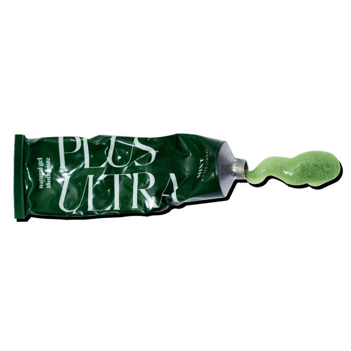 A metallic green tube with Plus Ultra branding lies on a white background. The tube is open, dispensing a blob of thick, pale green All Natural Gel Toothpaste with minty freshness.
