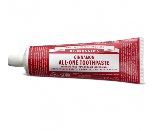 Dr. Bronners All-One Toothpaste in a red tube is proudly fluoride-free with 70% organic ingredients, promising to freshen breath, whiten teeth, and reduce plaque effectively.