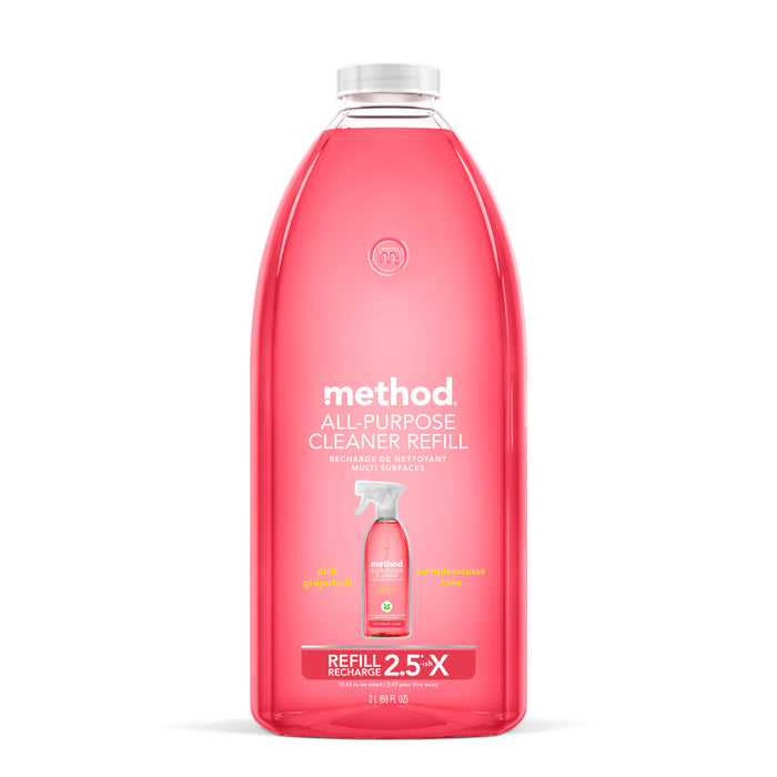 A clear bottle of method All Purpose Cleaner Refill in pink grapefruit scent, featuring vibrant pink liquid. The label highlights it as a 2.5x refill with 68 fl oz—an essential cleaning must-have for your home.