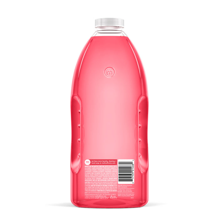 The method All Purpose Cleaner Refill comes in a large, transparent plastic bottle filled with pink liquid. It features a clear cap, an embossed logo on the front, and a barcode with text label on the back—a true grime thrasher for essential cleaning refills.