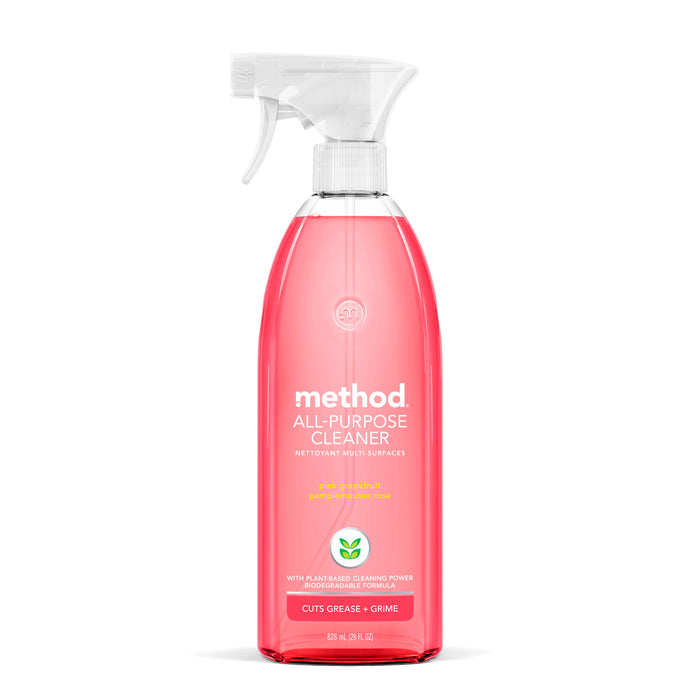 A transparent bottle of method All Purpose Cleaner displays pink liquid and a white spray nozzle. The label emphasizes cuts grease + grime using plant-based natural cleaning power, showcasing the Method Cleaning Spray formula for effective results.