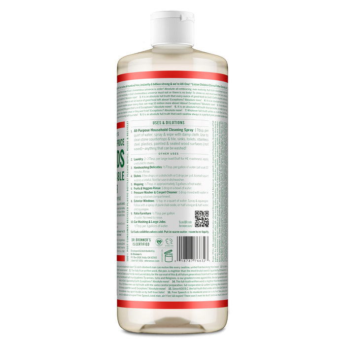 A clear Dr. Bronners All-Purpose Cleaner bottle with a white cap displays the back label, featuring usage instructions, dilution guidelines, and a QR code. Green and red text on white highlights its cruelty-free formula.