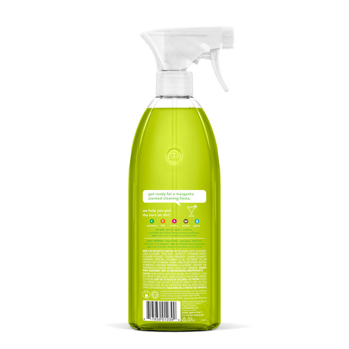 A clear spray bottle with green liquid and a white nozzle features a playful label for methods margarita-scented All Purpose Cleaner, showcasing vibrant icons and natural cleaning power for any mess.
