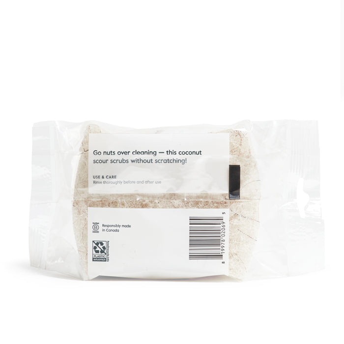 The Grove Co. Coconut Scouring Pads label reads, Go nuts over cleaning — these non-abrasive coconut scouring pads scrub without scratching! The packaging includes care instructions and a barcode, highlighting the products responsible manufacturing in Canada.