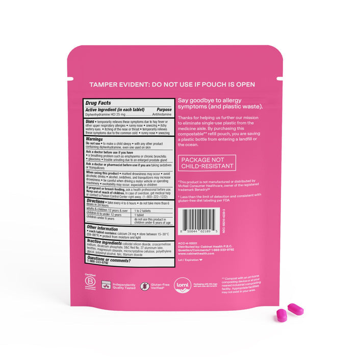 The image shows the back of a Cabinet Health Allergy Relief Refill pouch, featuring compostable packaging with warnings and recycling info. The active ingredient, Diphenhydramine 25 mg, is highlighted on the pink label. Two pink capsules are placed next to it.