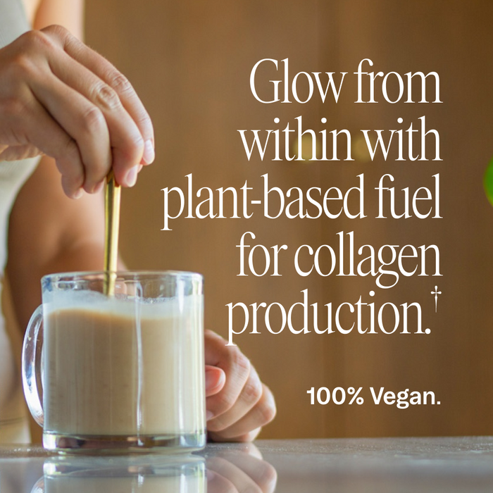 A person stirs a creamy drink in a clear mug with a spoon. Text on the image reads: Glow from within with Aloe Gorgeous by Ora Organic—a vegan collagen-boosting powder for plant-based support. 100% Vegan.