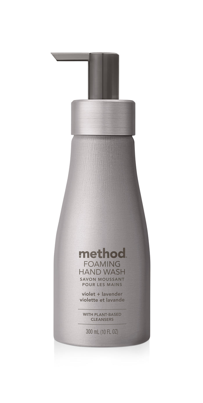 Methods Aluminum Foaming Hand Soap, with a violet and lavender scent, features plant-based cleansers. The sensitive skin-friendly silver bottle holds 300 ml (10 fl oz) of aromatic bliss and includes a pump dispenser and product details.