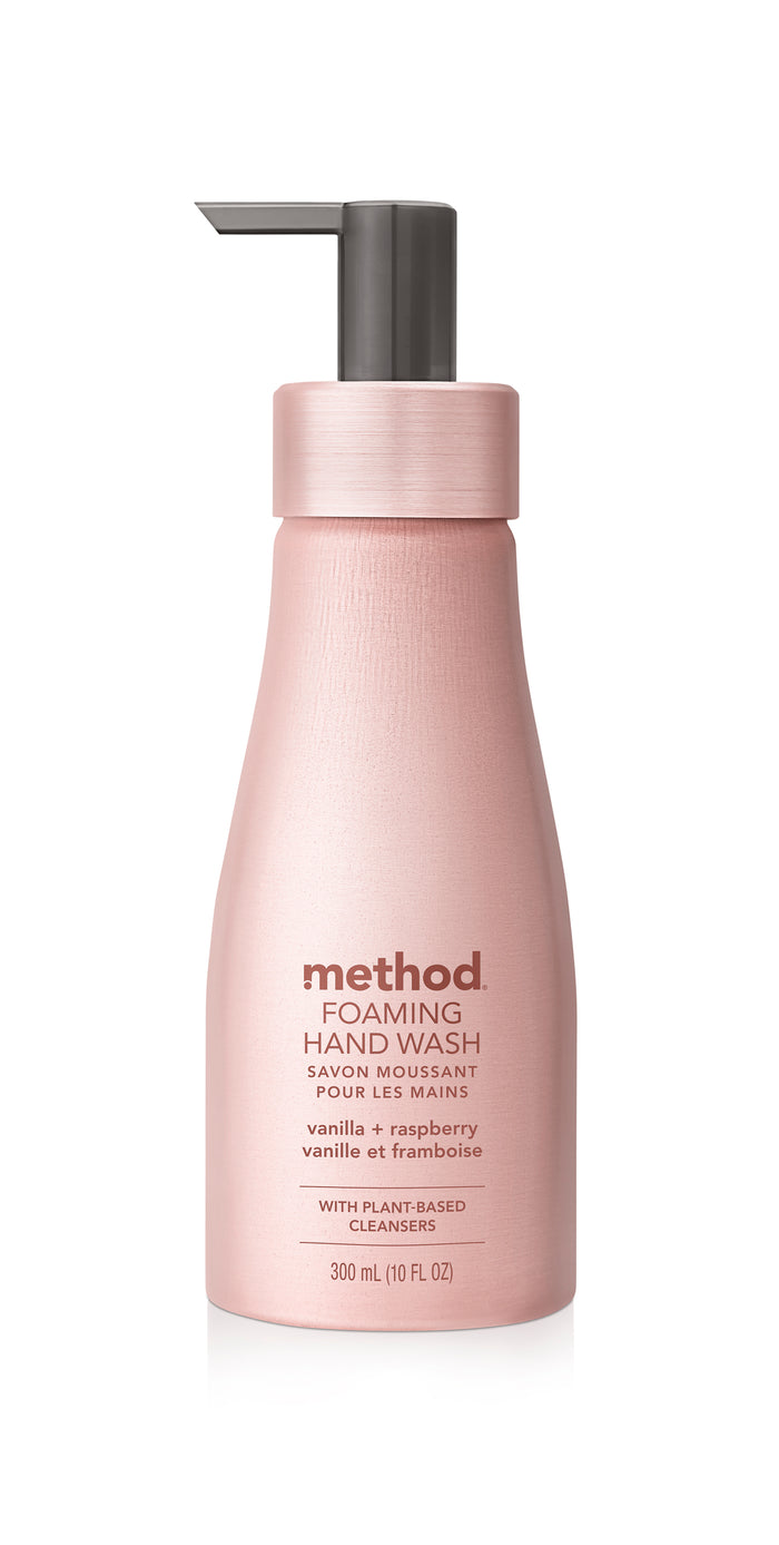 A refillable 300 ml pink bottle of method Aluminum Foaming Hand Soap with a gray pump top features vanilla + raspberry on its label, offering a delightful scent thats gentle on sensitive skin.