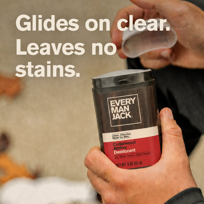 A person opens a stick of Every Man Jack Aluminum-Free Deodorant for Men, Naturally Derived. Text on screen says: Glides on clear. No stains left behind. Powered by natural odor fighters for long-lasting freshness, this aluminum-free deodorant is ideal for the outdoors. The outdoor background features a softly blurred surface.