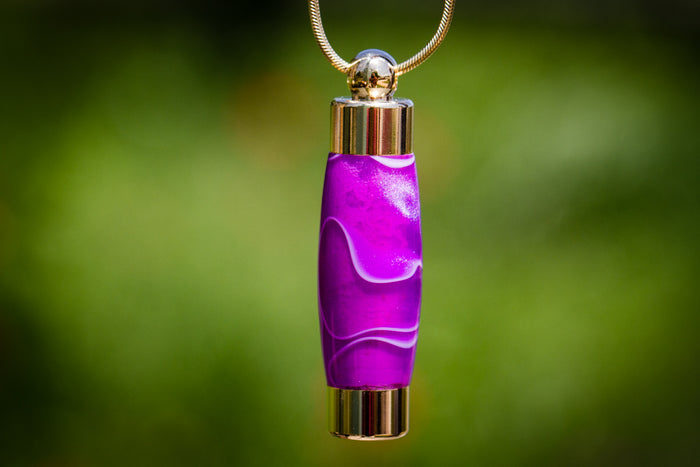 Purple amethyst acrylic keepsake urn pendant with gold caps for cremation ashes or hair on a chain