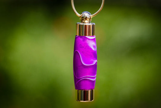 Purple amethyst acrylic keepsake urn pendant with gold caps for cremation ashes or hair on a chain