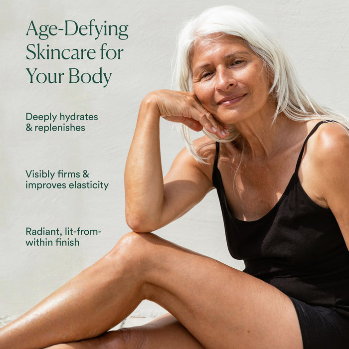 An older woman with long white hair sits relaxed, smiling in a black sleeveless outfit. Text beside her reads: “OSEA Anti-Aging Body Balm,” showcasing benefits such as hydration, enhanced skin elasticity, and a radiant finish.