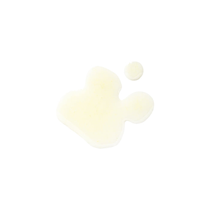 A small splash of white liquid on a white background creates an abstract shape with a circular droplet nearby, akin to how Tree To Tubs Anti Aging Green Tea, Hyaluronic & Retinol Serum delicately blends with sensitive skin for optimal rejuvenation.