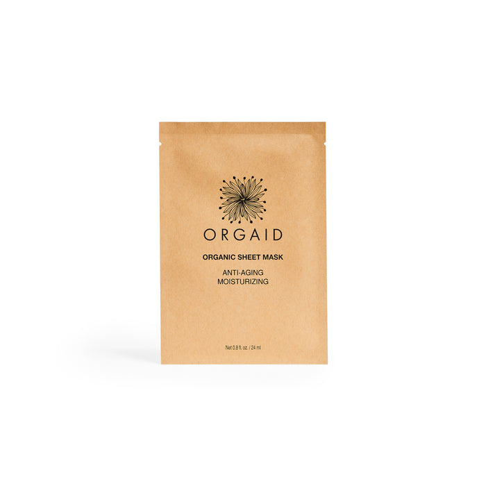 A brown ORGAID package of the Anti-Aging & Moisturizing Organic Sheet Mask features Anti-Aging Moisturizing text on the front, complemented by a stylish black sunburst logo.