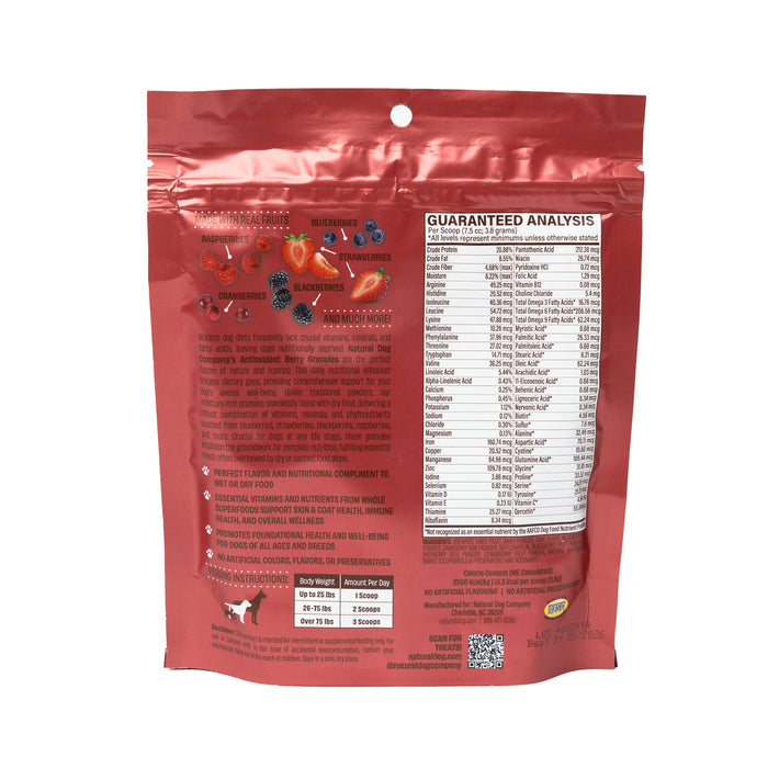 Natural Dog Companys Antioxidant Berry Superfood Granules come in red packaging highlighting raspberries, blueberries, strawberries, and blackberries. The back shows a guaranteed analysis of nutrients and an immune system support feeding guide for dogs by weight.