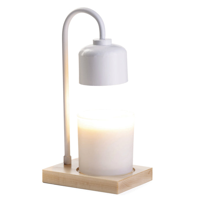 The Arched Candle Warmer Lamp by Candle Warmers Etc. has an elegant design with a curved neck lamp over a lit white candle on a light wood base, enhancing any home décor with its modern style and warm ambiance.