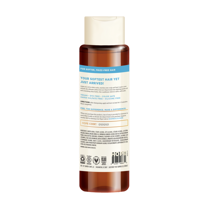 The 7 fl oz / 207 ml Argan Oil Softening Conditioner by Soapbox promises softer, frizz-free hair with a vitamin complex. It is vegan, sulfate-free, silicone-free, and color-safe. Directions for use and a hope code are also included on the label.