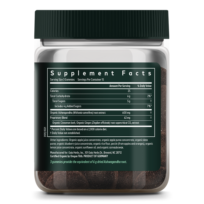 The transparent Ashwagandha Gummies jar by Gaia Herbs features a black lid and a label with supplement facts. It highlights stress-relief ingredients like Ashwagandha root extract and organic apple puree concentrate, along with essential nutritional information and serving details.