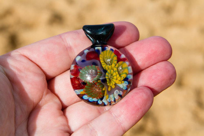 Atlantic Coral Reef glass pendant containing cremains within colorful coral polyps; each piece is unique.
