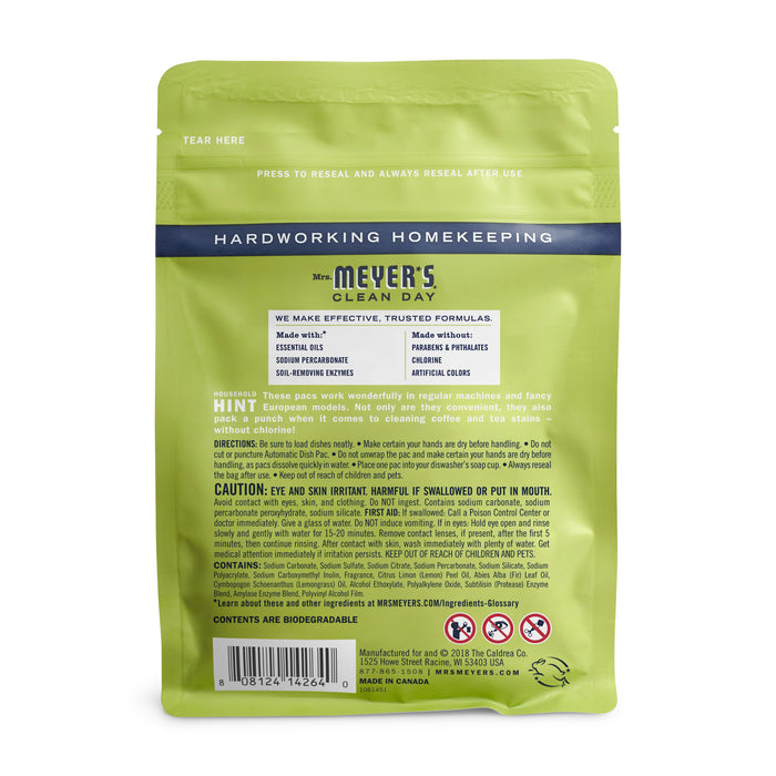 A green Mrs. Meyers package for Automatic Dish Pacs includes ingredient and usage details for a homekeeping product with an oxygen-bleach formula. The label shares warnings and tips, while the bag features a resealable strip at the top.