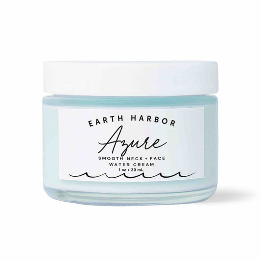 The 1 oz Earth Harbor AZURE Smooth Neck + Face Water Cream comes in a white jar with light blue contents, wave graphics, and emphasizes its Seaweed Amino Acids. This regenerative formula revitalizes your neck and face.