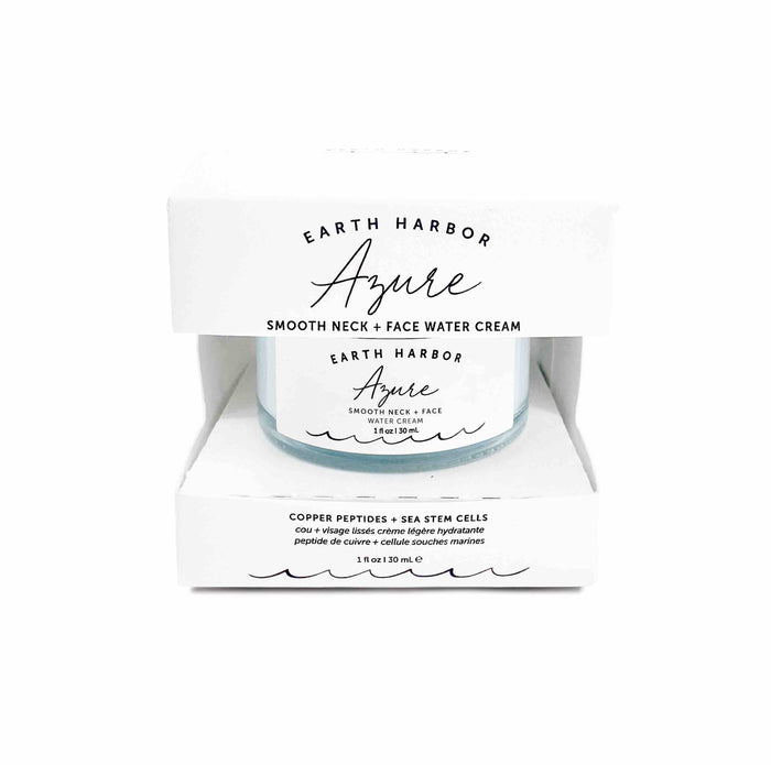 The open packaging displays Earth Harbors AZURE Smooth Neck + Face Water Cream. The transparent jar shows the teal blue cream with seaweed amino acids and copper peptides; its label highlights sea stem cells, indicating a 1 fl oz (30 mL) size.