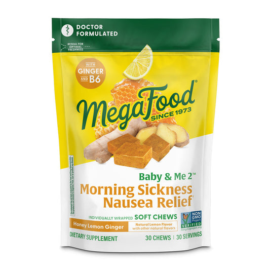 A package of MegaFood Baby & Me 2 - Morning Sickness Nausea Relief provides 30 honey lemon ginger chews, each with ginger and vitamin B6 for effective nausea relief. The front features images of ginger, honeycomb, and a lemon slice.
