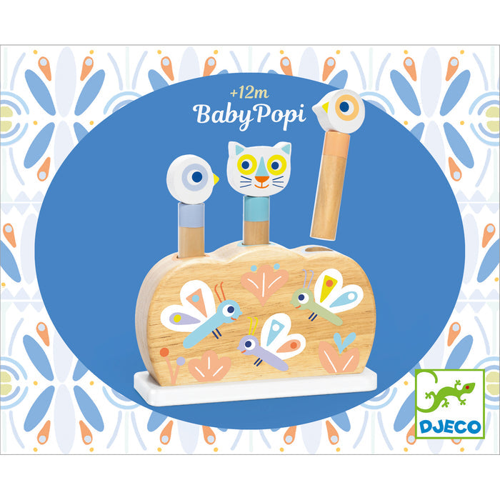 The Baby Popi Pop-Up Puzzle Toy by DJECO is a wooden toy made from FSC® Certified wood. It features a block with three colorful animal pegs, decorated with butterflies and flowers to enhance motor skills development. Featuring one peg that pops out, its designed for ages 12 months and up.