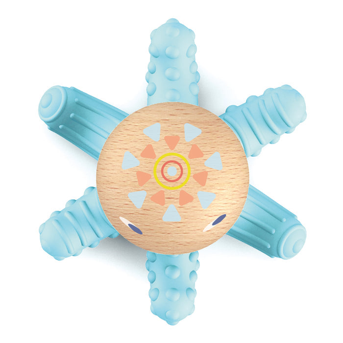The DJECO BabySquidi Infant Teether, suitable for 0+ months, is an FSC Certified wooden toy resembling an octopus-shaped ring. It has a central disc with colorful geometric designs and five textured blue arms for sensory play and development.