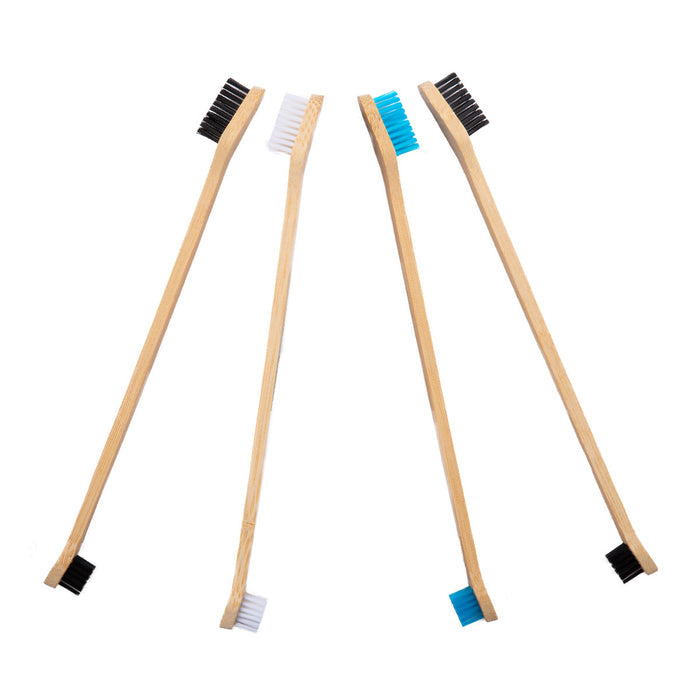 Five Mighty Mutt bamboo double-sided toothbrushes for pets, featuring black, white, and blue bristles, are elegantly arranged in a radial pattern on a pristine white background, embodying sustainable pet dental care.