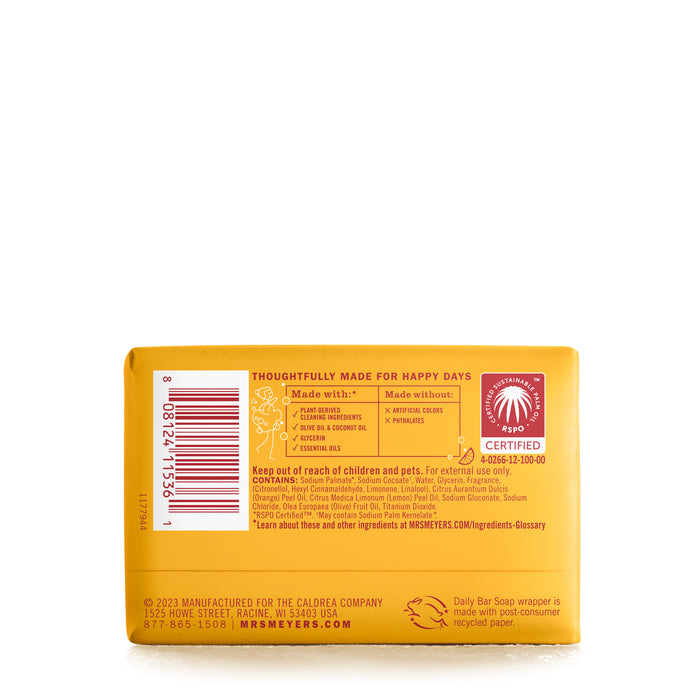 The image shows a Mrs. Meyers Bar Soap package back, featuring garden-inspired scents and crafted with plant-derived ingredients, glycerin, and essential oils. It displays the Leaping Bunny logo on yellow packaging with brown text and includes recycling symbols and certification logos.
