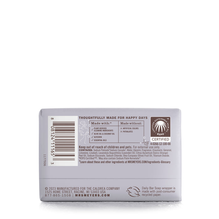 The image displays the back of a Mrs. Meyers Bar Soap package with information on ingredients, certification, and contact details. Highlighting natural ingredients and garden-inspired scents, it is labeled “Thoughtfully Made for Happy Days” and is proudly Leaping Bunny certified.